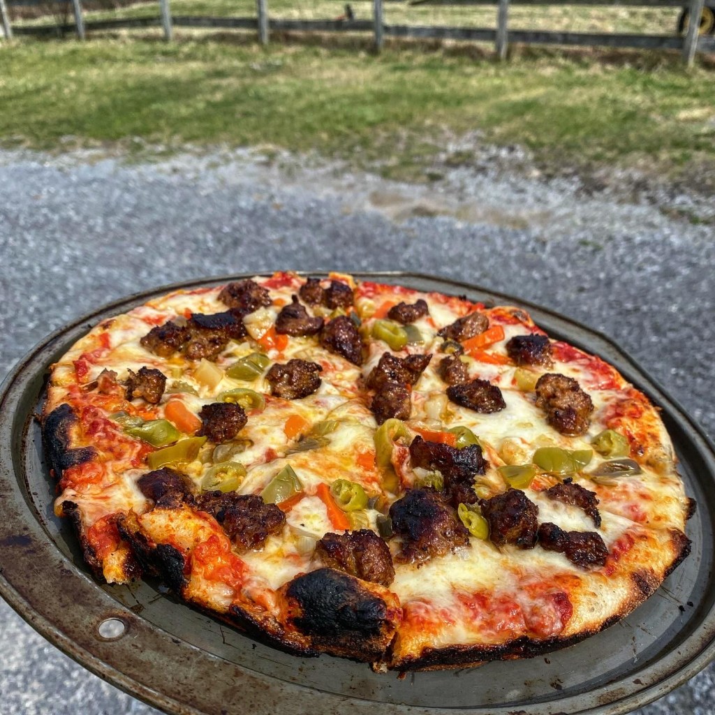 A modified 12" South Shore bar pizza cooked in the Stoke Pizza Oven