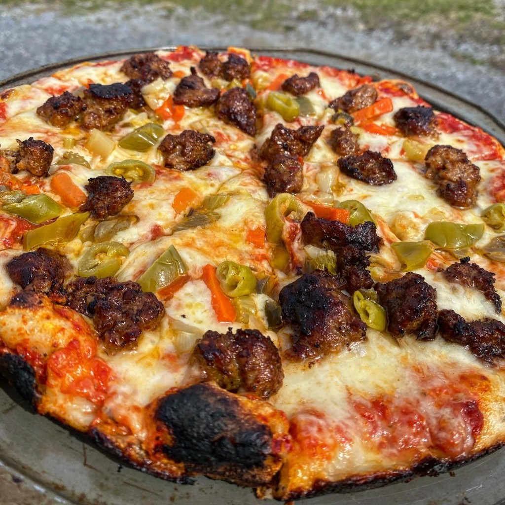 A modified 12" South Shore bar pizza cooked in the Stoke Pizza Oven