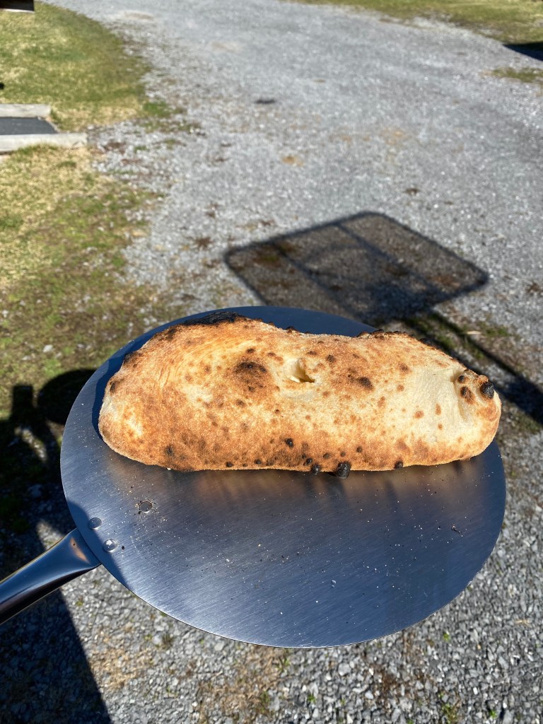 Calzone baked in the Stoke pizza oven